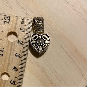 Beautiful.925 solid charm with onyx on back swivel